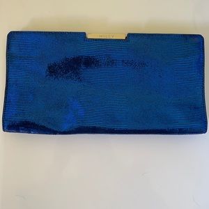 Milly “Kendra” frame iridescent blue clutch